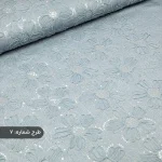 پارچه لی طرحدار فیروزه ای طرح گل